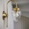 Vägglampa - Blomberg 80 mässing, droppe klarglas